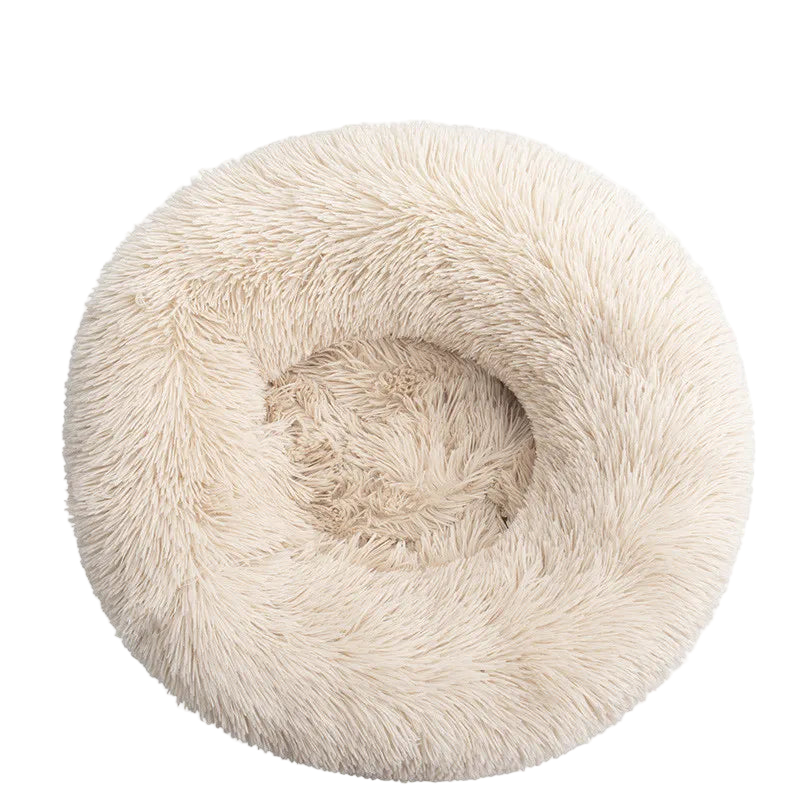 Light brown fluffy pet bed on a white background