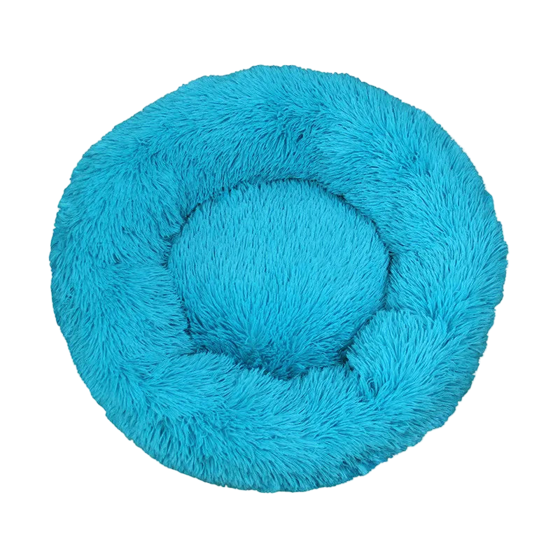 Blue fluffy pet bed on a white background